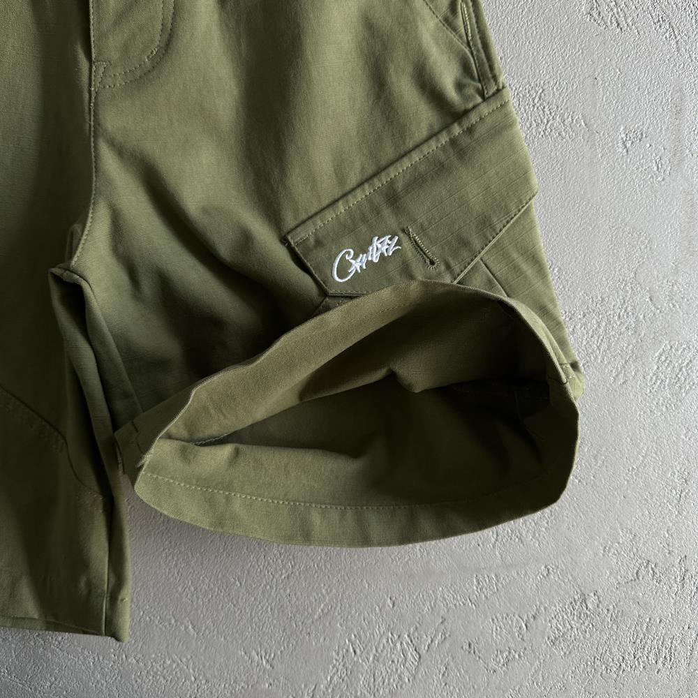 Slant pocket green shorts