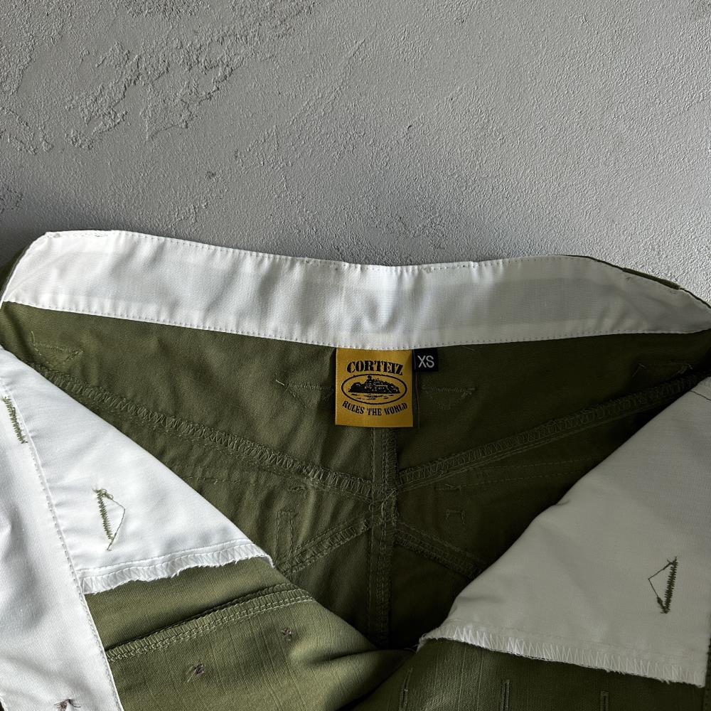 Slant pocket green shorts