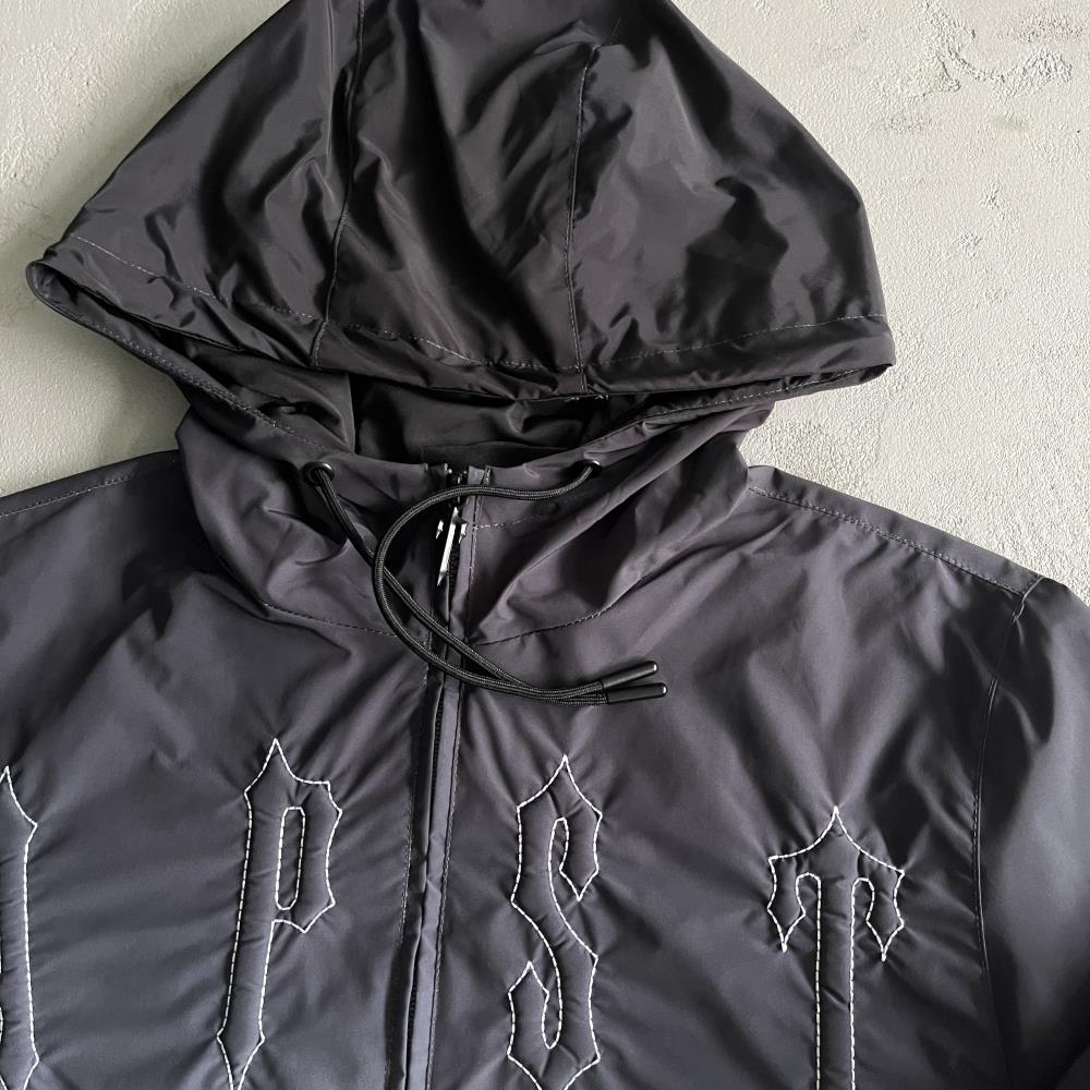 outline arch windbreaker-black gradient