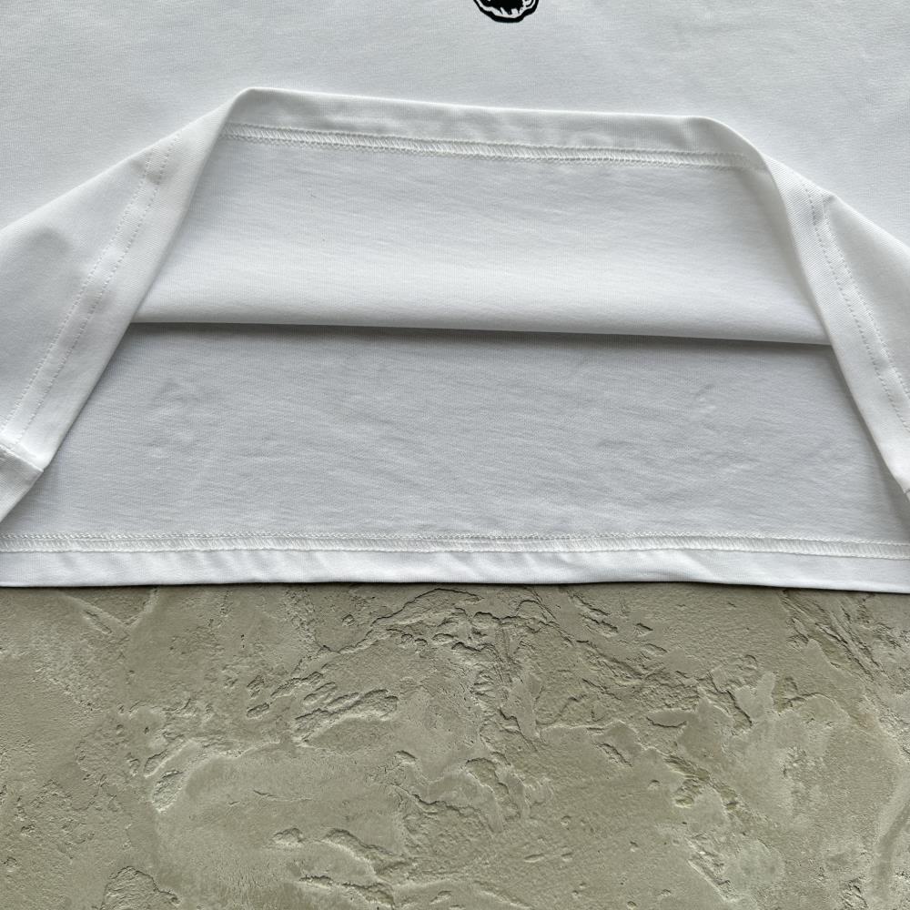 flying man statue tee