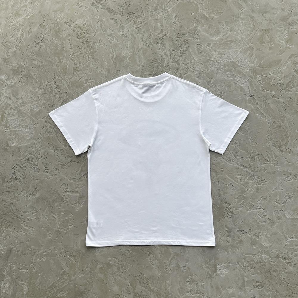 flying man statue tee