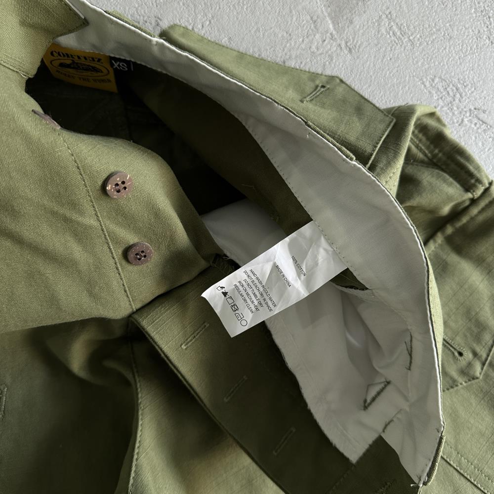 Slant pocket green shorts