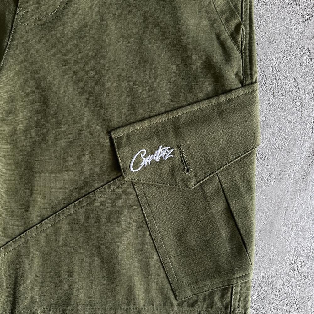 Slant pocket green shorts