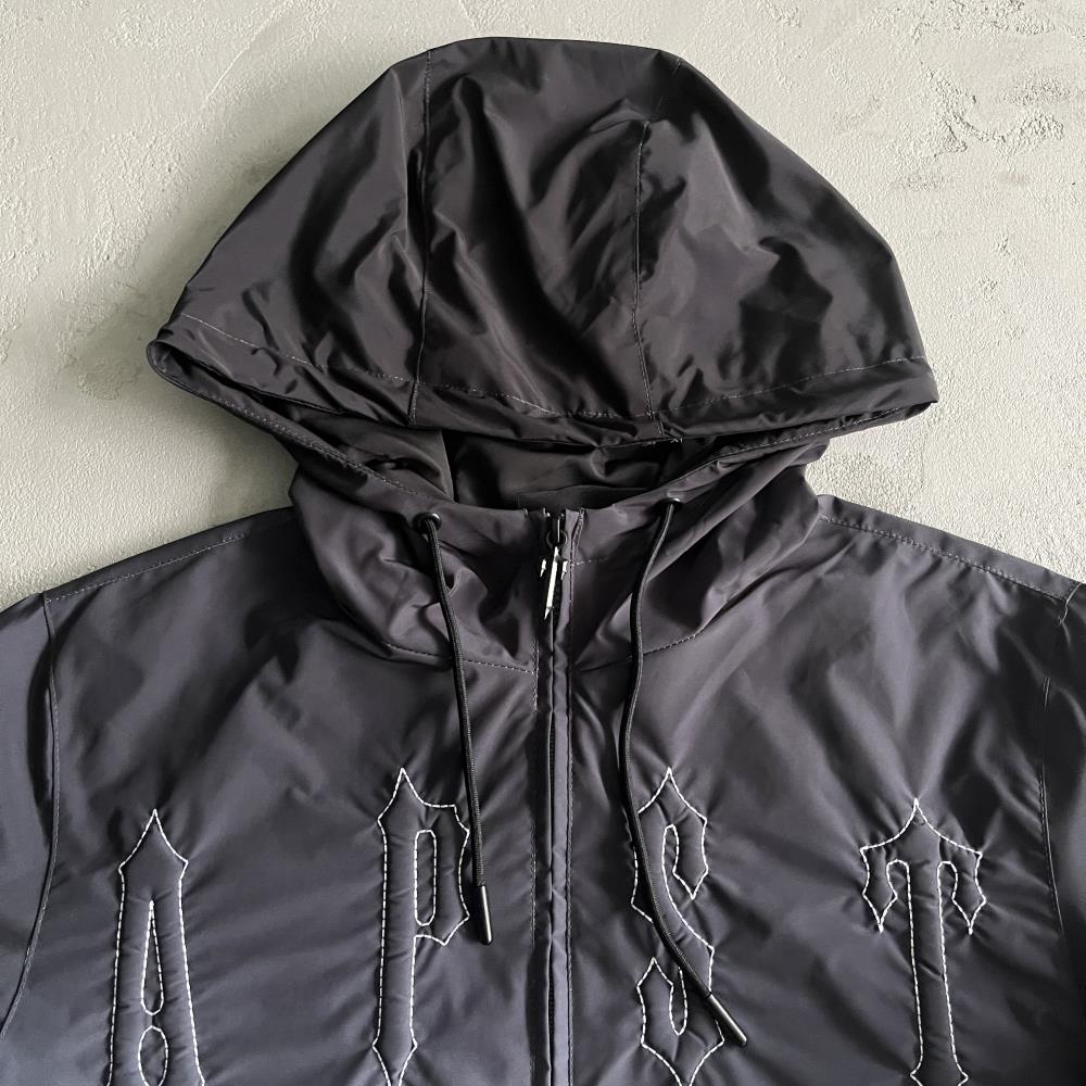 outline arch windbreaker-black gradient