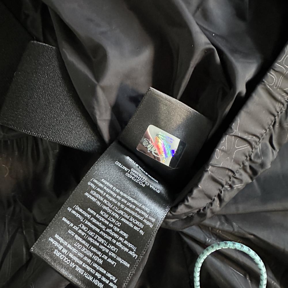 syna down jacket- Black and blue