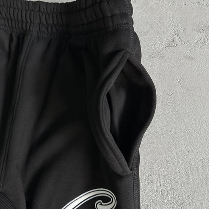 Satin C-star applique suit-black