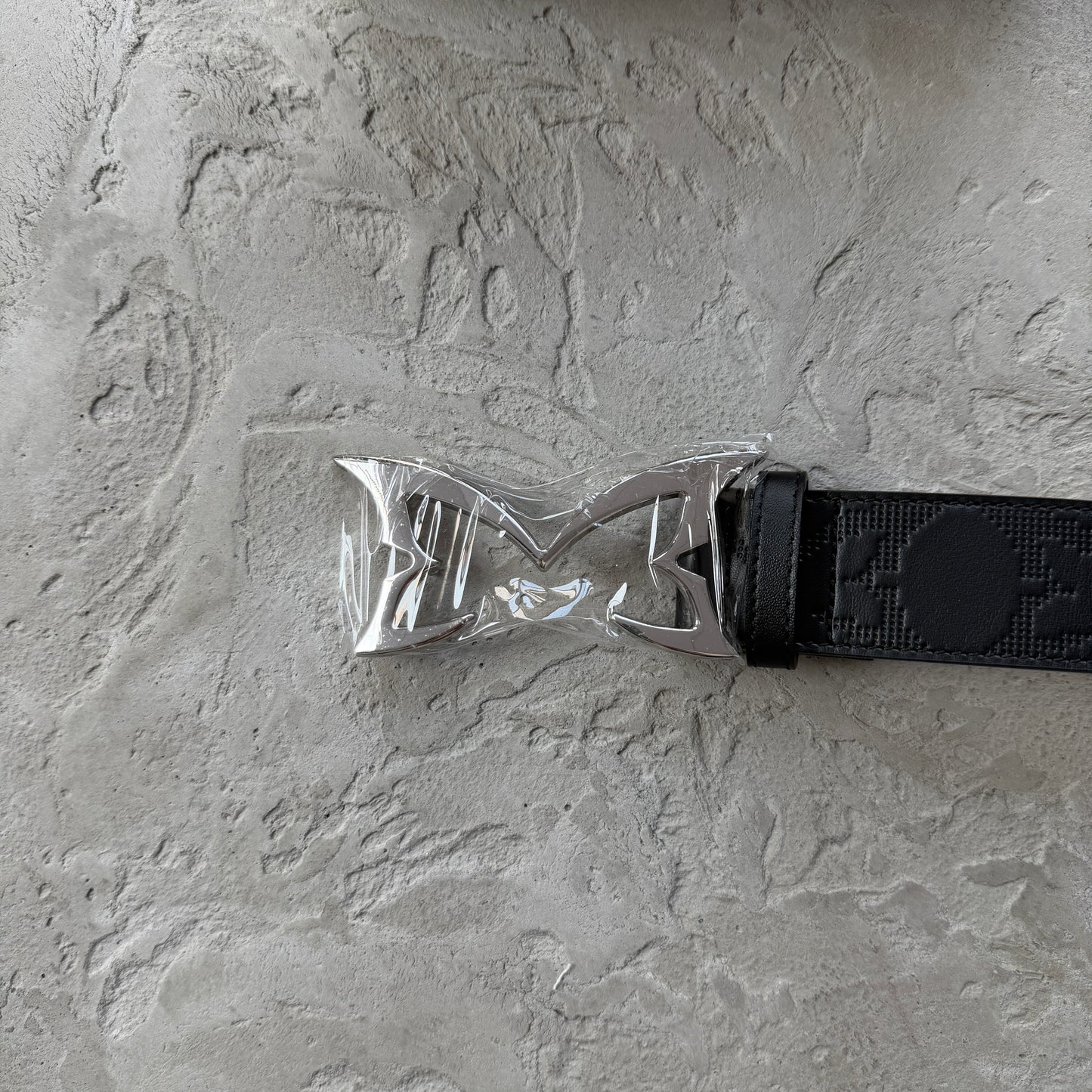ME debossed belt