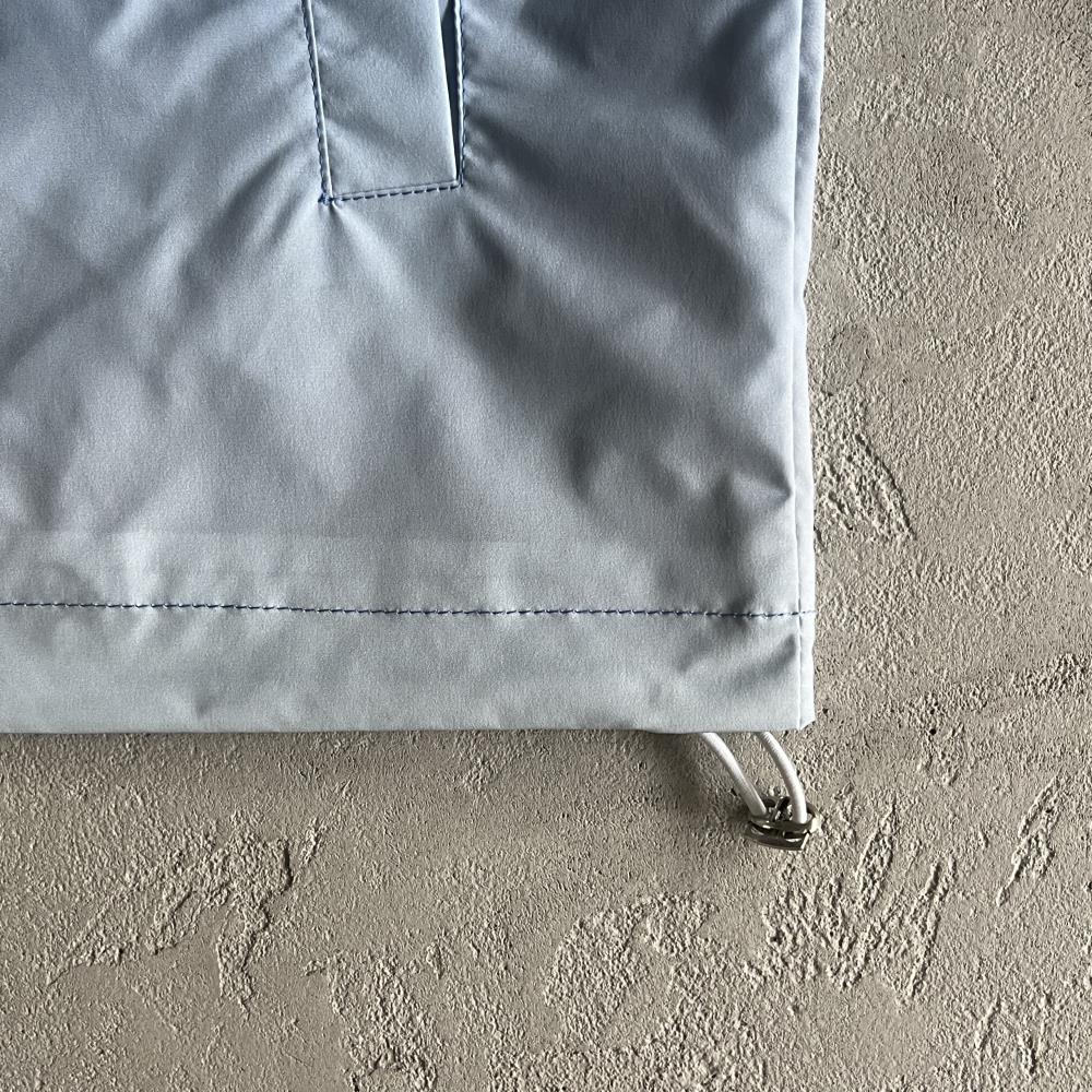 outline arch windbreaker-sky blue gradient